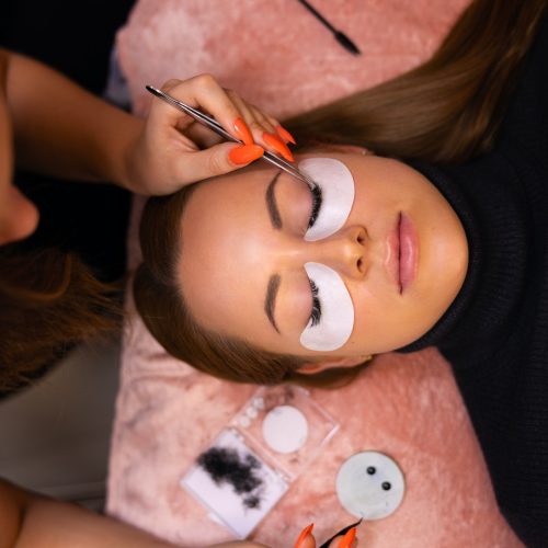 Female Client Going Through Eyelash Extension Procedure