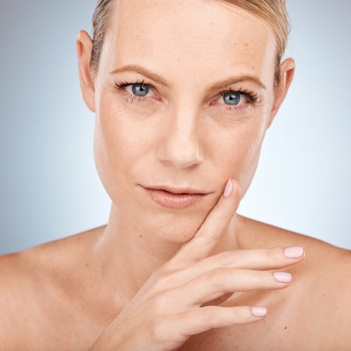 Mature woman, beauty and portrait of natural cosmetics, anti aging skincare or facial glow on studi